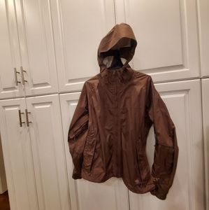 Women's medium Mountain Hard Wear rain jacket. Used, like new.